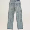 Tvättade jeans för dam med öglor över hela plagget