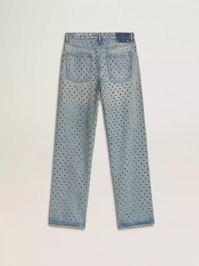 Tvättade jeans för dam med öglor över hela plagget