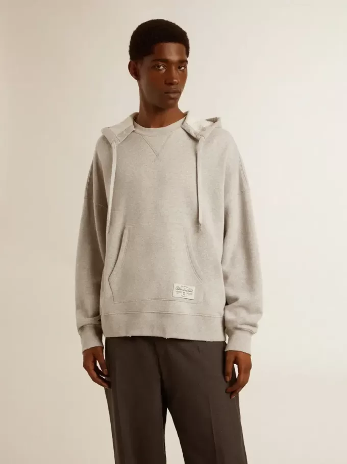 Unisex-hoodie i bomull med tryck på ryggen