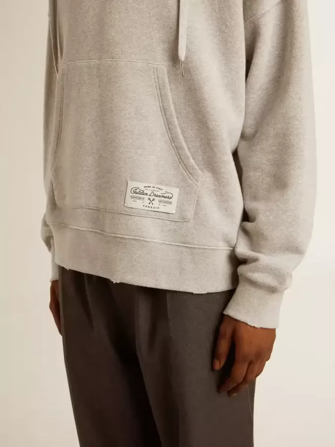 Unisex-hoodie i bomull med tryck på ryggen