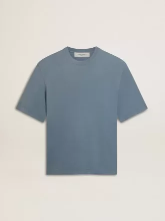 Unisex-T-shirt i bomull i babyblått med omvänd tryck på baksidan