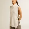 Unisex vit höghalsad ärmlös tröja i ribbad ull Unisex vit höghalsad ärmlös tröja i ribbad ull