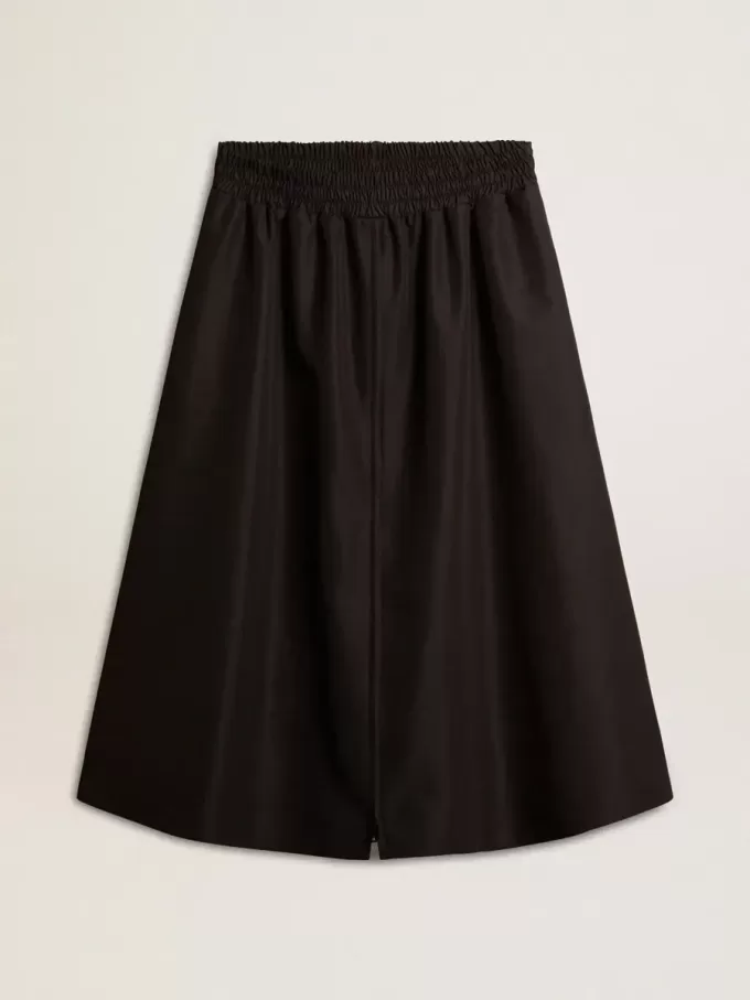 Utställd kjol i svart tekniskt nylon