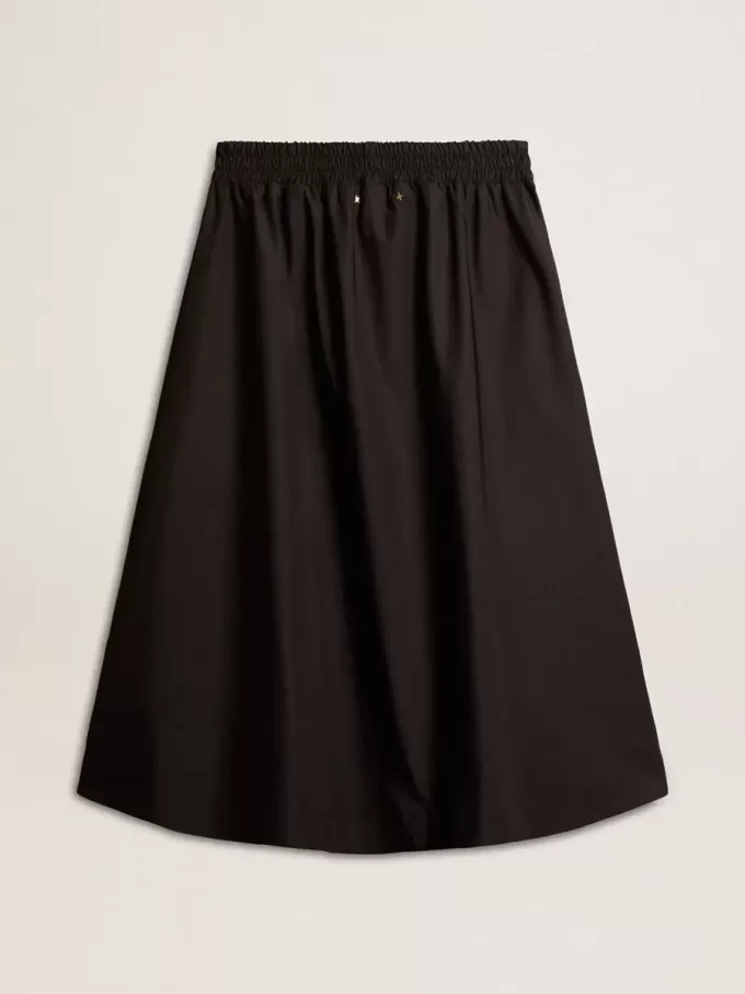 Utställd kjol i svart tekniskt nylon