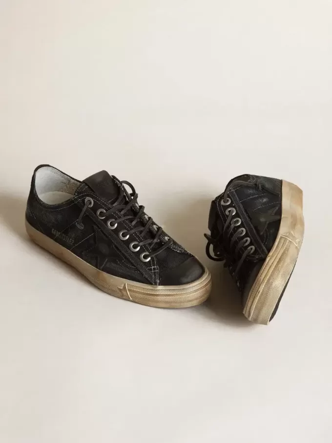 V-Star i midnattsblå denim med svart läderstjärna och tå