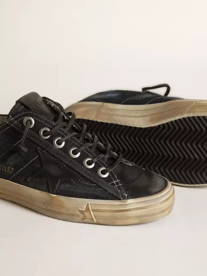 V-Star i midnattsblå denim med svart läderstjärna och tå