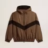 Vindjacka i beige och svart hundtandsmönster Vindjacka i beige och svart hundtandsmönster