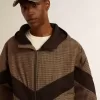 Vindjacka i beige och svart hundtandsmönster Vindjacka i beige och svart hundtandsmönster