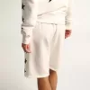 Vintage vita bermuda-shorts för herr med kontrasterande svarta stjärnor Vintage vita bermuda-shorts för herr med kontrasterande svarta stjärnor