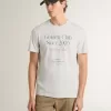 Vit bomullst-shirt för herr med grönt tryck Vit bomullst-shirt för herr med grönt tryck
