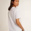 Vit dam-T-shirt med mörkblå stjärna på framsidan Vit dam-T-shirt med mörkblå stjärna på framsidan