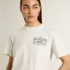 Vit dam-T-shirt med svart tryck på bröstet Vit dam-T-shirt med svart tryck på bröstet