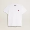 Vit dam-T-shirt med vinröd stjärna på framsidan Vit dam-T-shirt med vinröd stjärna på framsidan