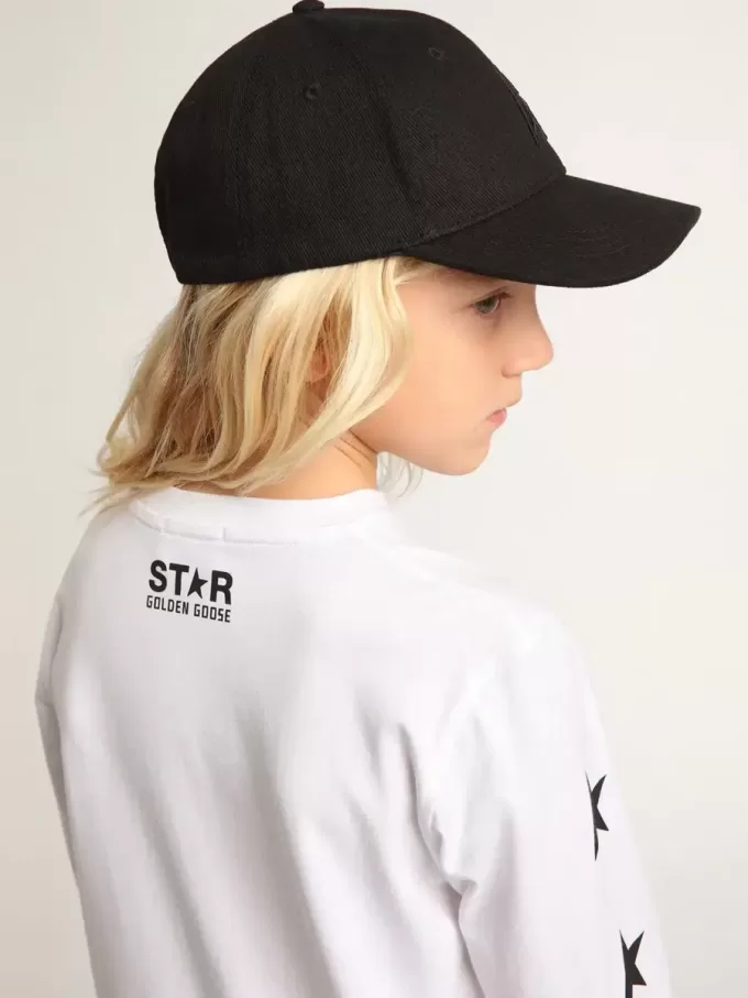 Vit långärmad T-shirt med kontrasterande svarta stjärnor Vit långärmad T-shirt med kontrasterande svarta stjärnor