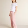 Vit och silverfärgad T-shirt med logotyp och maxistjärna i silverglitter