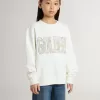 Vit sweatshirt för flickor med mångfärgad Golden-text på framsidan Vit sweatshirt för flickor med mångfärgad Golden-text på framsidan