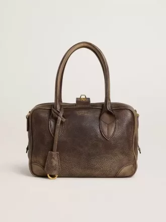 Vita Bag i brunt vintage-läder med gulddetaljer