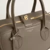 Vita Bag i salviagrönt läder med gulddetaljer Vita Bag i salviagrönt läder med gulddetaljer