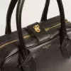 Vita Bag i svart fårskinn med gulddetaljer Vita Bag i svart fårskinn med gulddetaljer