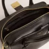 Vita Bag i svart fårskinn med gulddetaljer Vita Bag i svart fårskinn med gulddetaljer