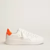 Vita Purestar-sneakers med fluorescerande orange hälflik Vita Purestar-sneakers med fluorescerande orange hälflik