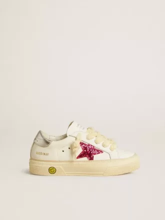 Young May med fuchsia glitterstjärna och metallisk läderhälflik