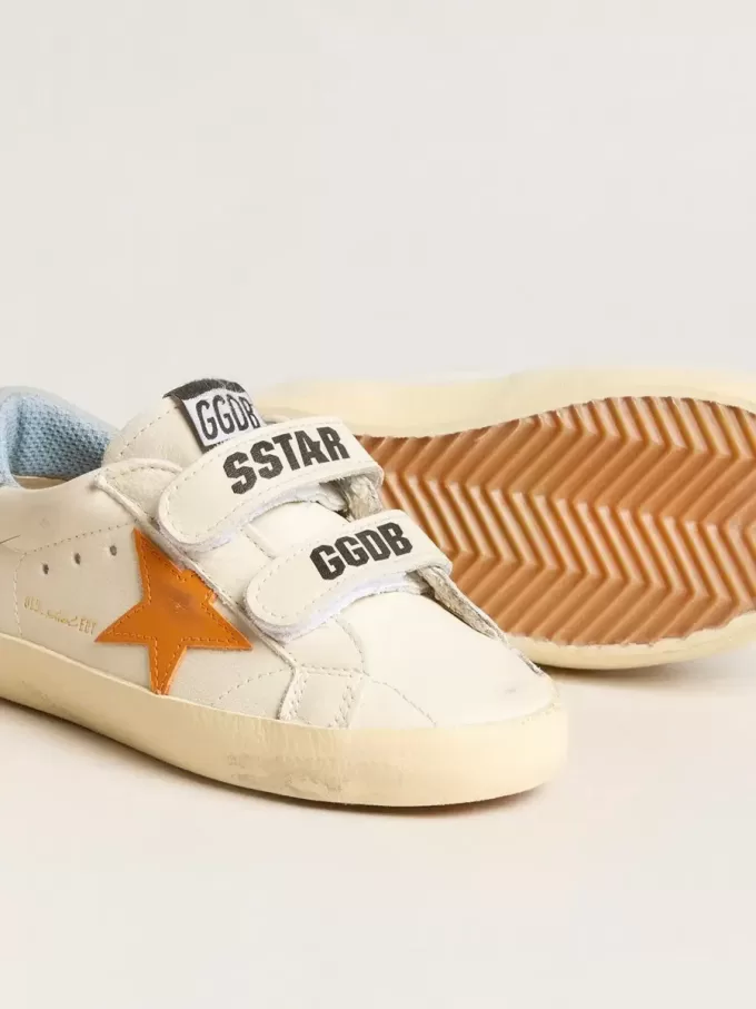 Young Old School i läder med orange stjärna och babyblå hälflik Young Old School i läder med orange stjärna och babyblå hälflik